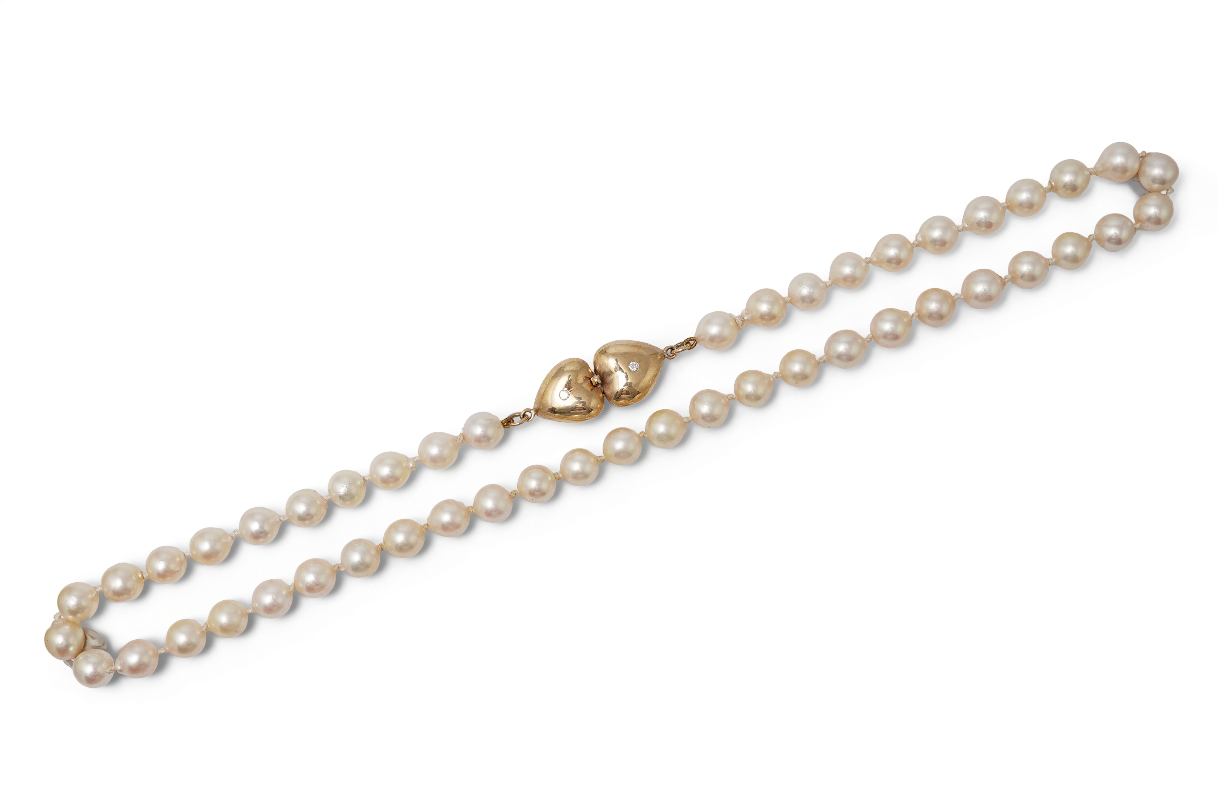 A cultured pearl, gold and diamond necklace
